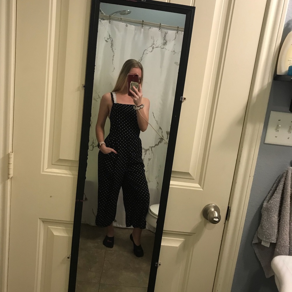Black polka dot jumpsuit.
